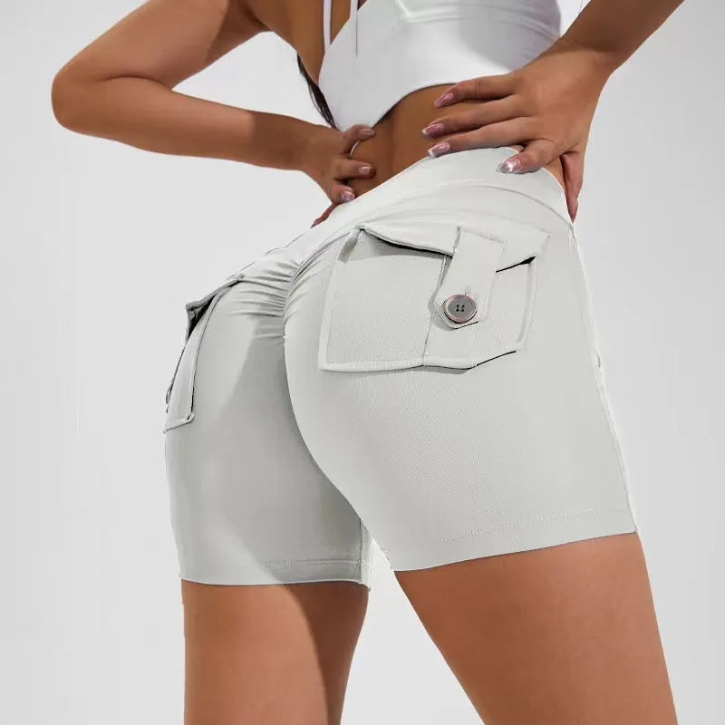 Women's high waist hip lifting sports shorts with side pockets in electric blue colour