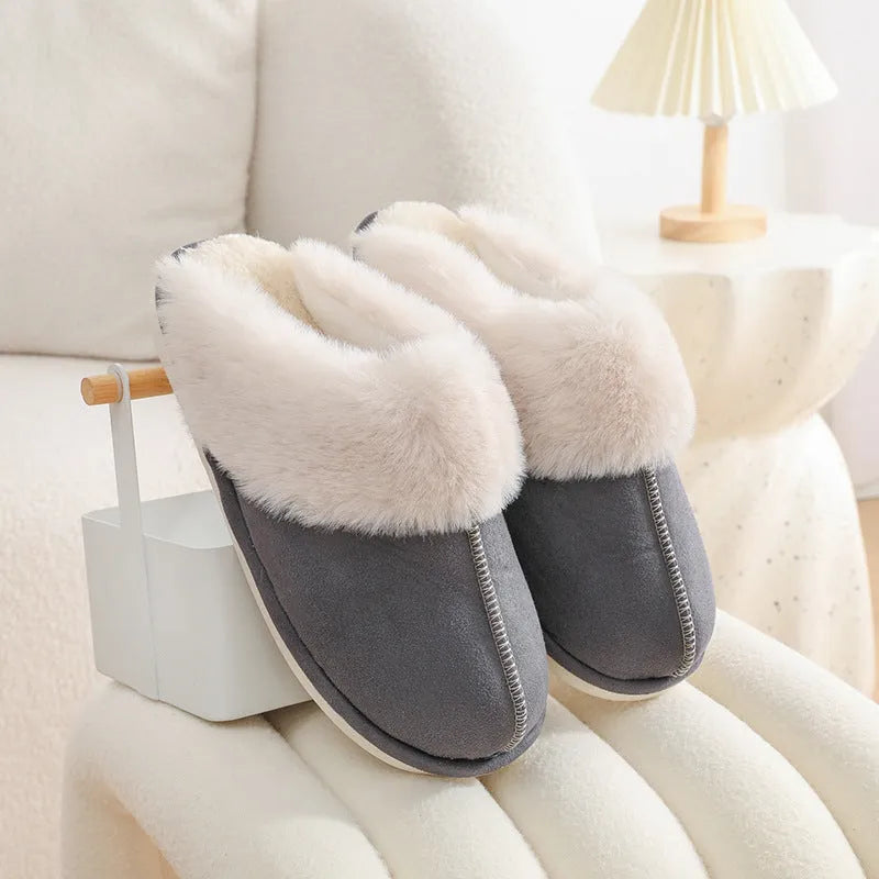 Brown women's plush indoor slippers with round toe, stitching detail, and flat non-slip sole.