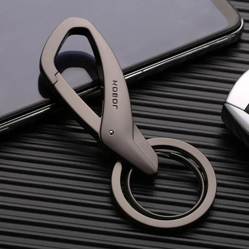 Zinc alloy car key waist hanging double ring in black chrome or nickel colour measuring 8.3 by 3.5 centimetres