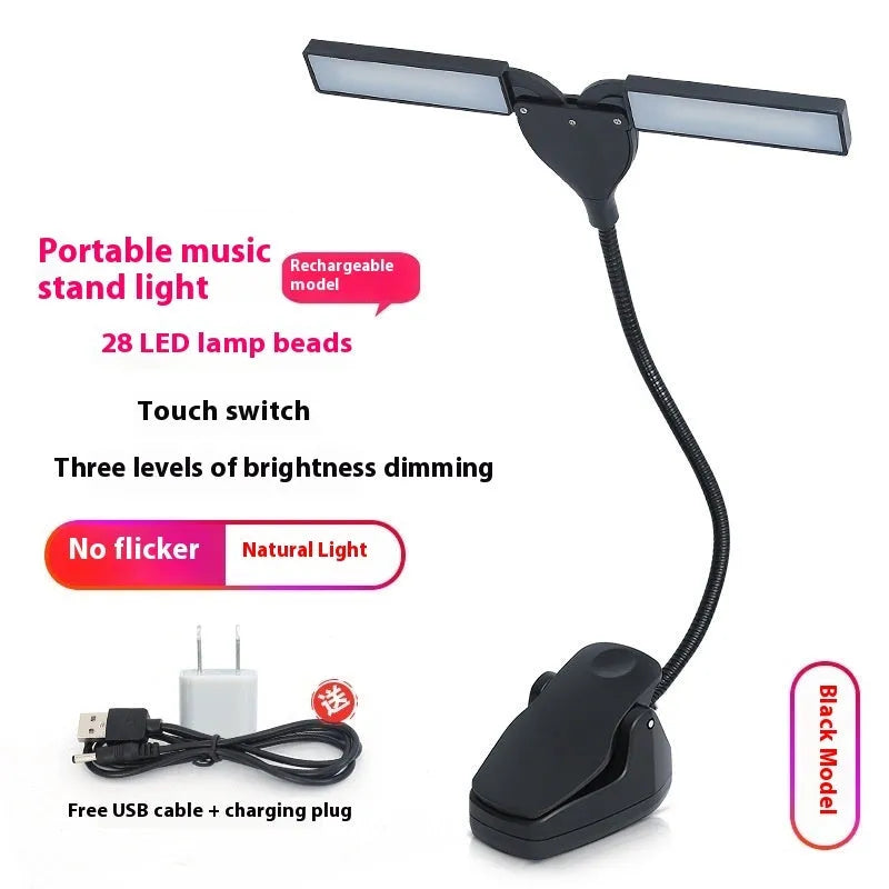 Rechargeable black music stand light with 28 lamps and USB cable on a music stand.