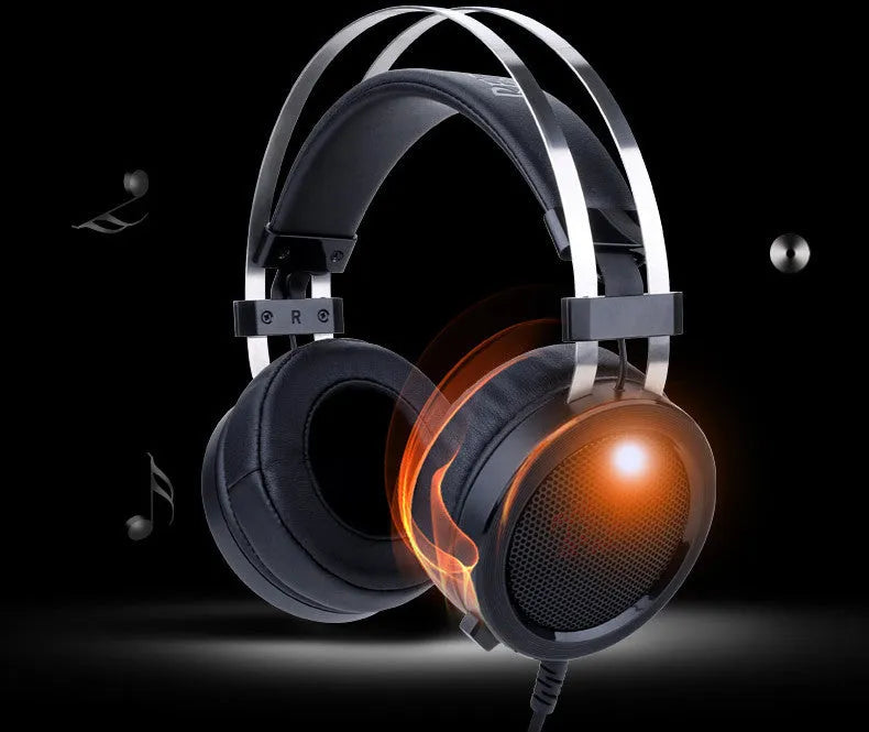 Black wired over-ear computer gaming headset with a long cable and a 3.5mm plug.