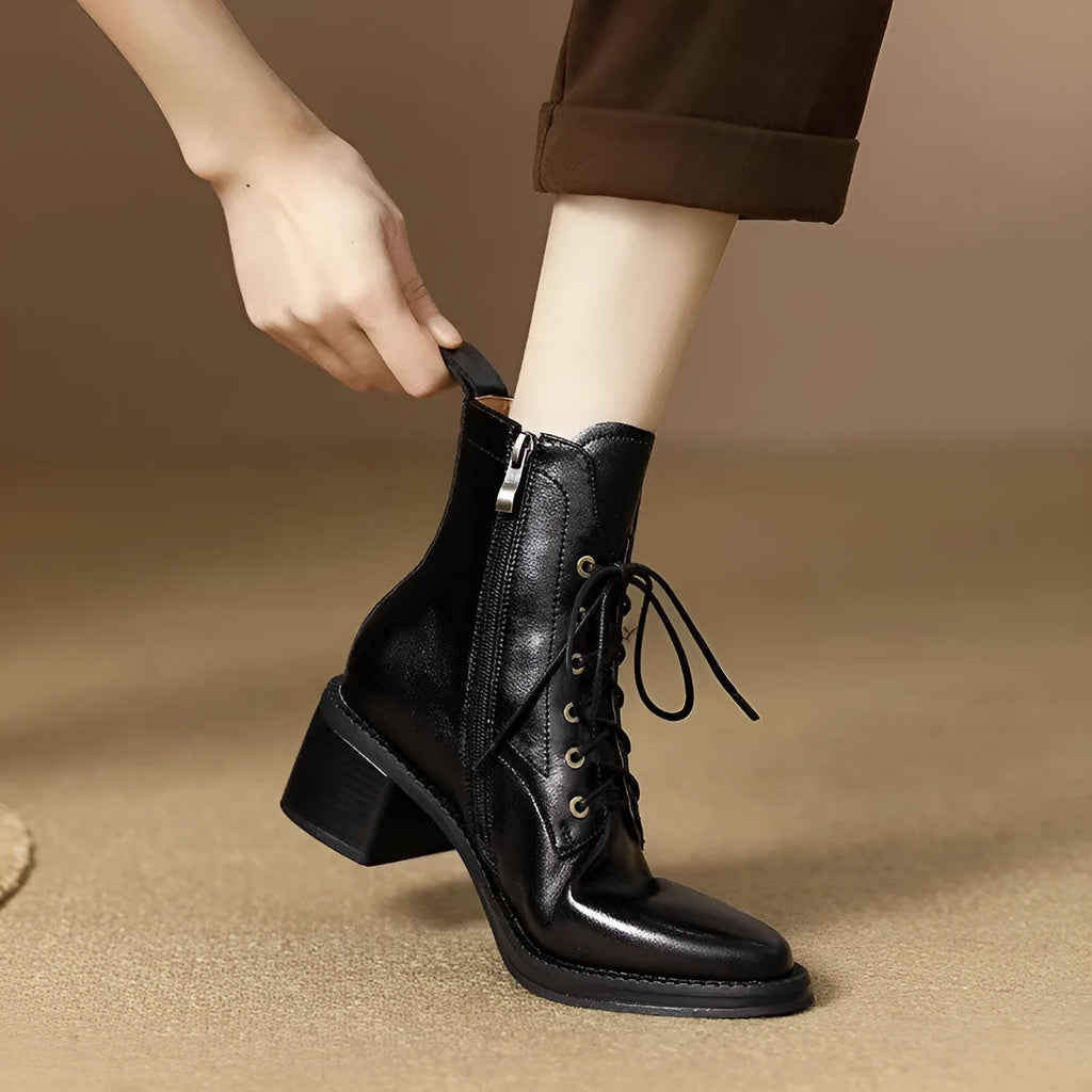 Women's black pointed toe short tube boots with 5.5cm block heel and ankle shaft height