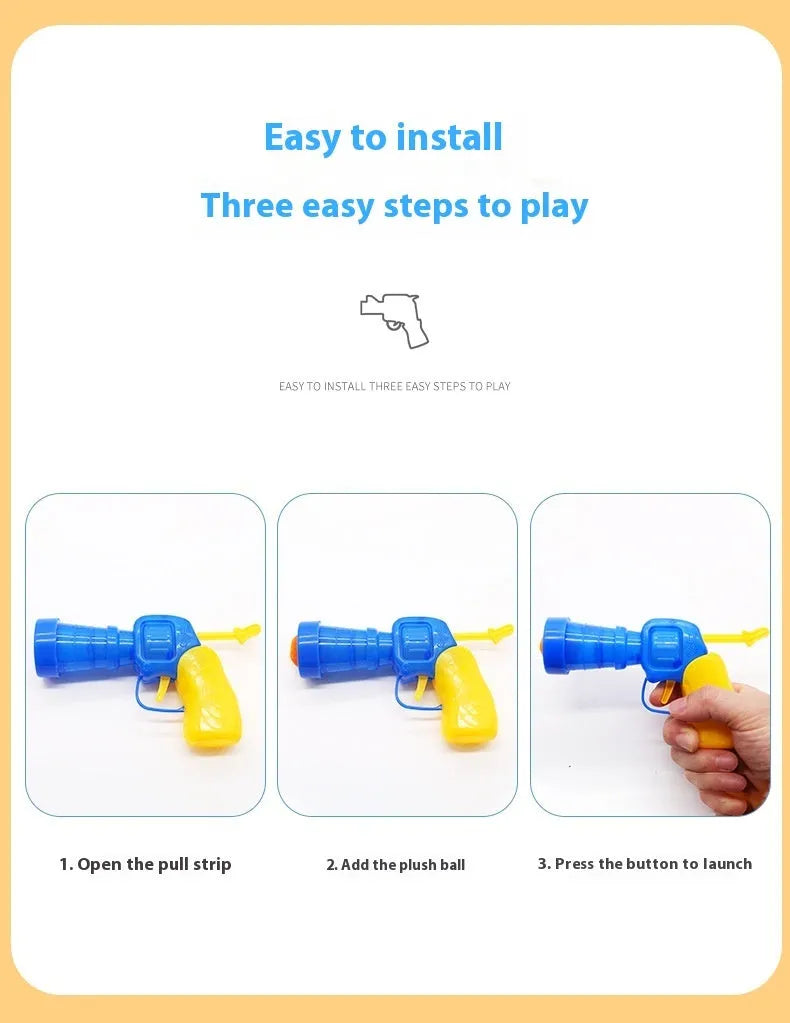 Pet toy launcher gun with assortment of soft plush balls for dog fetching games