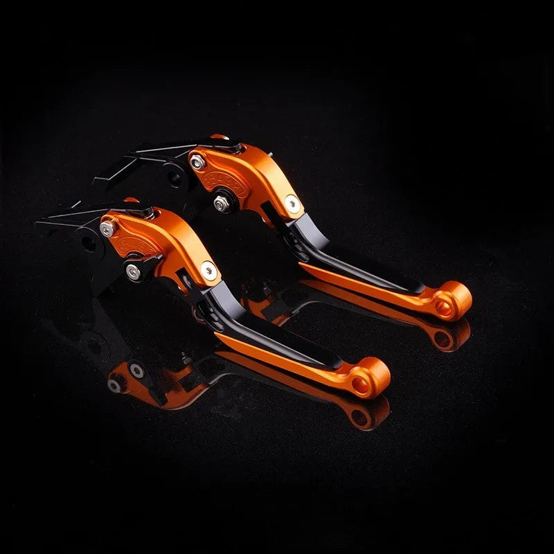 Pair of anodised metal motorcycle horn handle clutch levers with six-speed adjustable length, shown in a selection of colour finishes