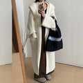 Women's loose hooded cardigan coat in beige with raglan sleeves and extended length