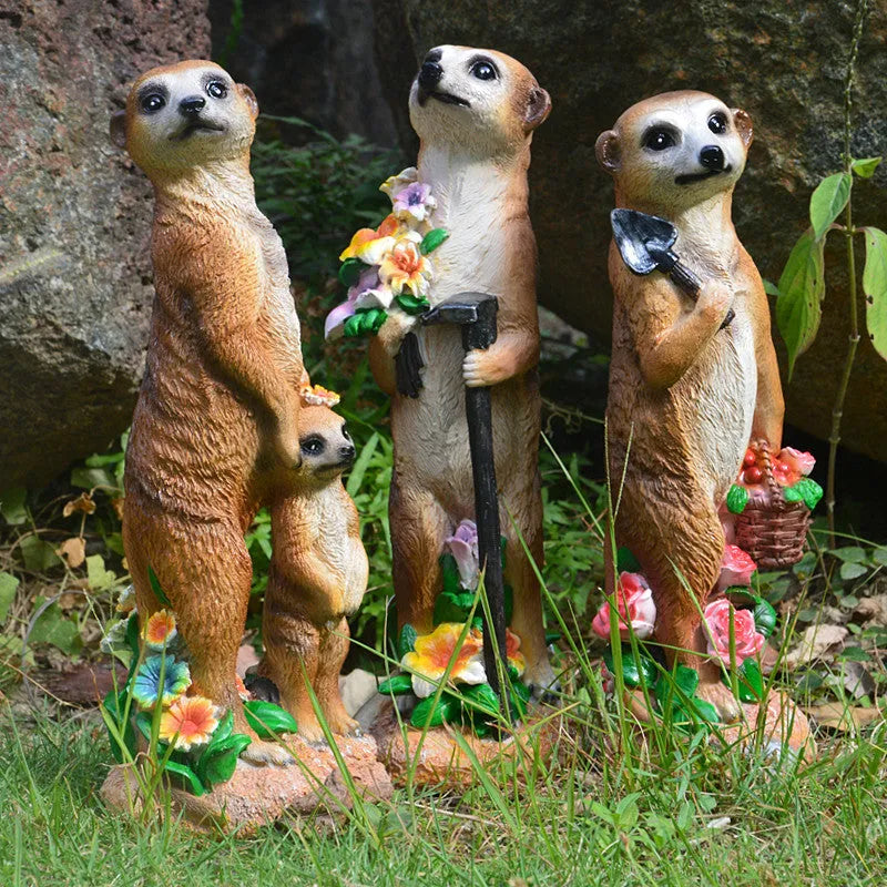 Straw hat mongoose garden ornament crafted from synthetic resin in three colour variations