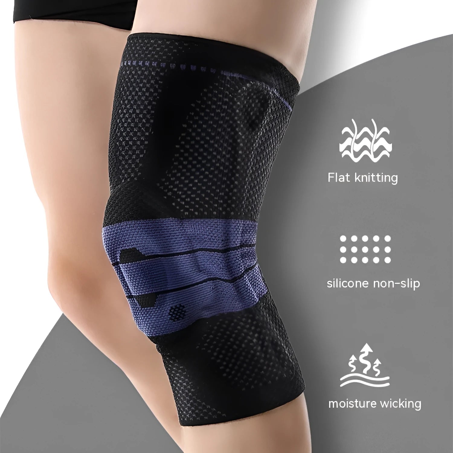 Adult sports knee pads in black and blue colour, shown on a knee for size reference.