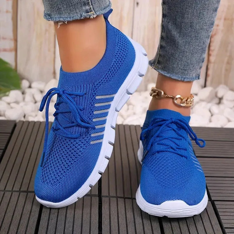 Women's breathable mesh flying knit flat shoes with round toe and low heel design