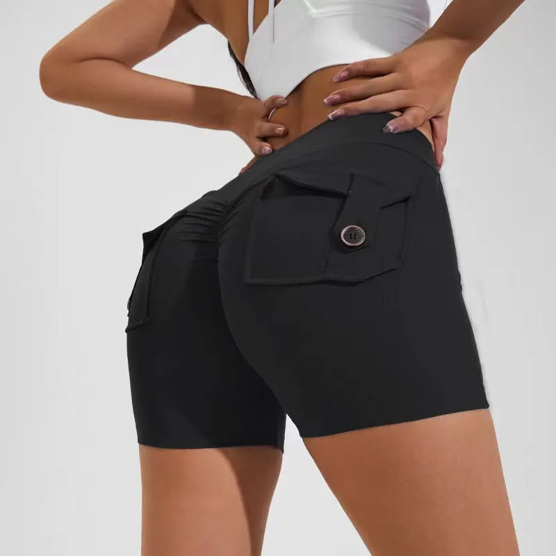 Women's high waist hip lifting sports shorts with side pockets in electric blue colour
