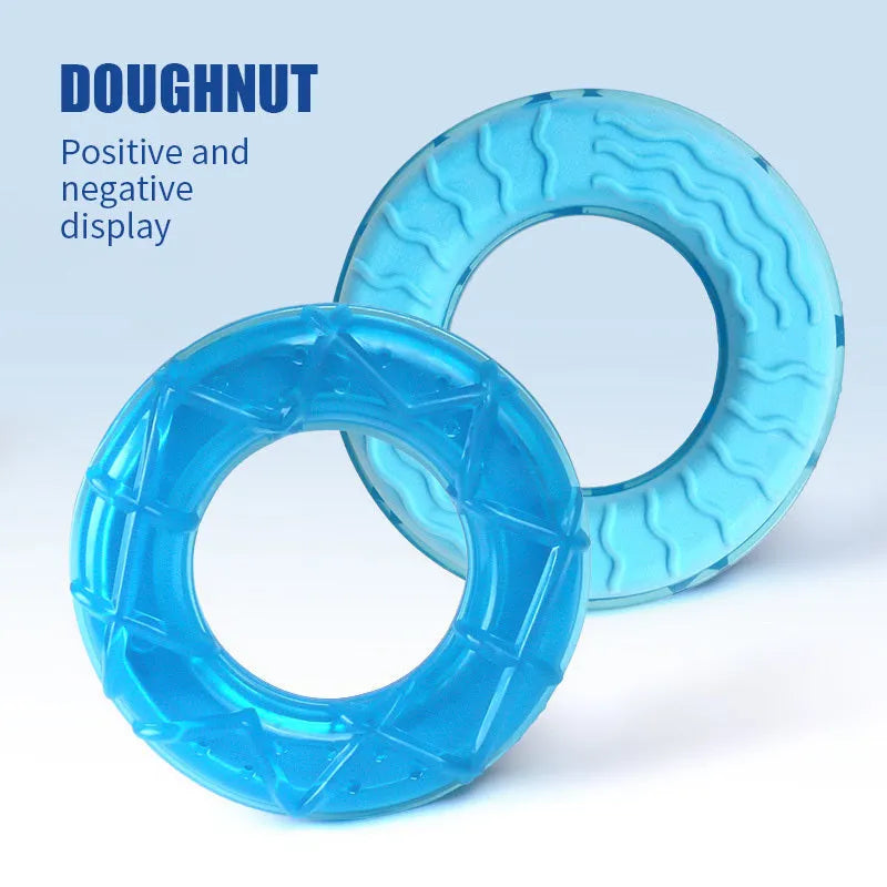 Set of three hollow silicone dog toys: a blue pacifier, a red popsicle, and a green ring for filling with water and freezing.