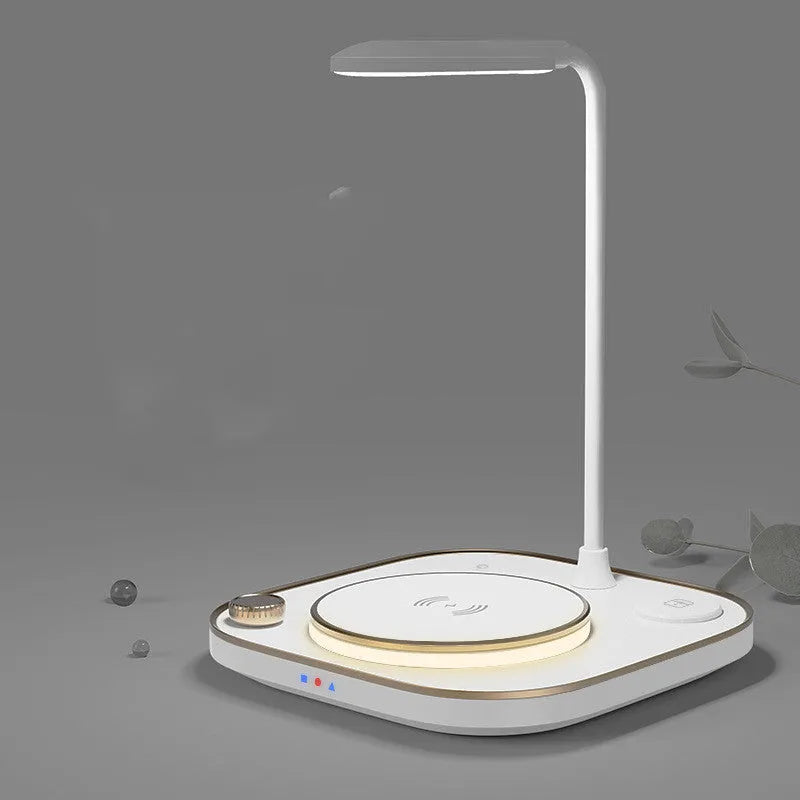 Black wireless charging desk lamp with 15W fast charging capability showing multiple device charging