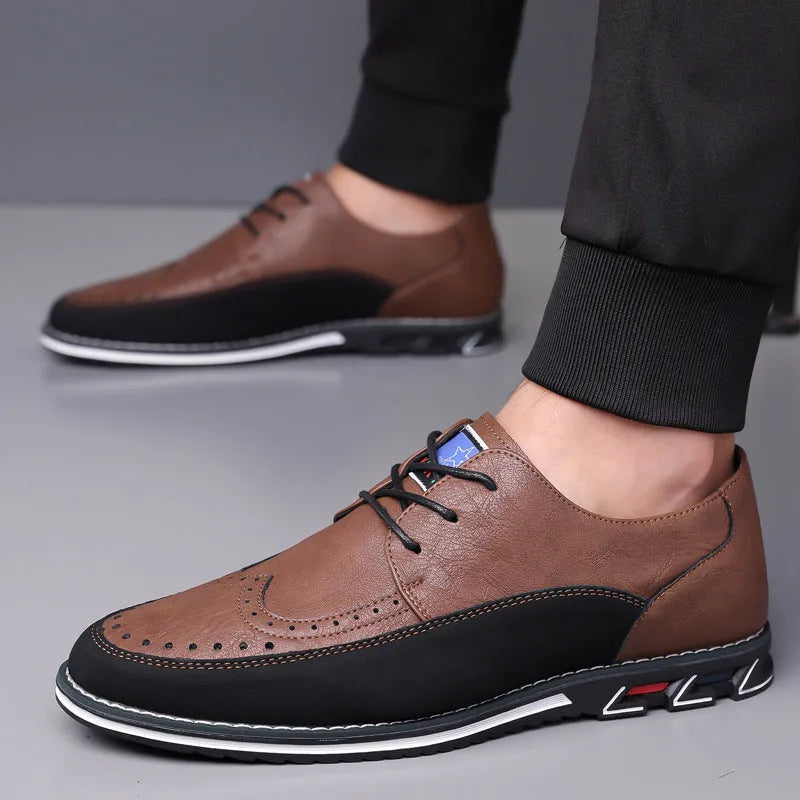 Men's leather slip-on shoes in black, grey, khaki and orange colours with rubber soles and low-top design
