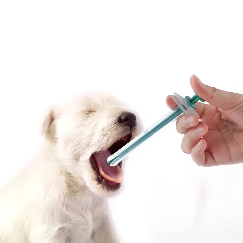 Two pet pill shooters with soft silicone tips for cat and dog medication administration