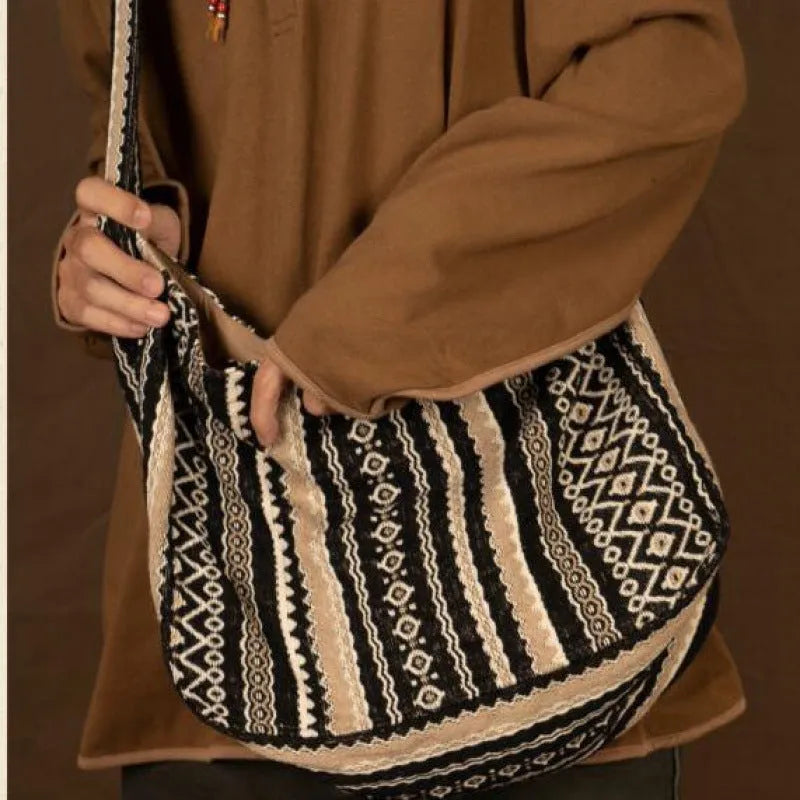 Retro striped corduroy messenger bag with adjustable plaid strap and zipper closure
