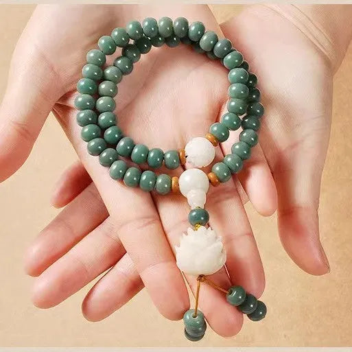 White jade bodhi seed bracelet with green sandalwood tones and double ring safety buckle clasp