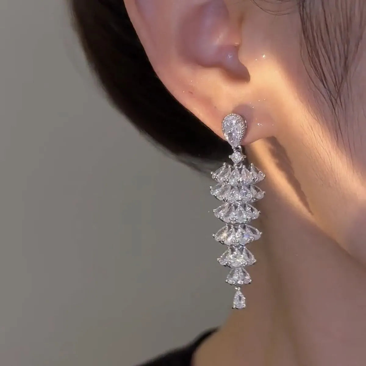 Silver pagoda Christmas tree drop earrings with sparkling zircon crystals on copper stud earrings