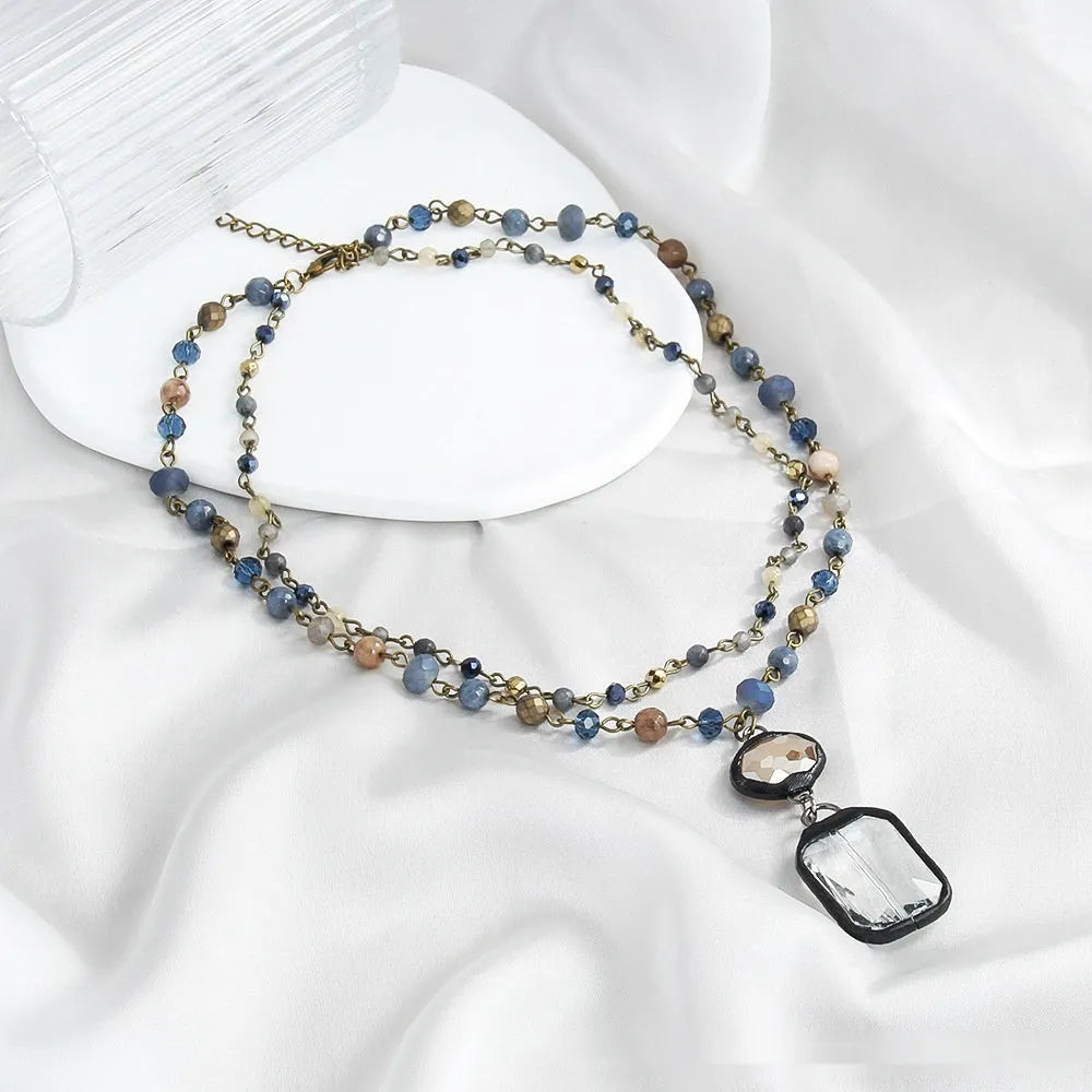 Two-layer tribal necklace with natural stone and glass pendant on adjustable chain