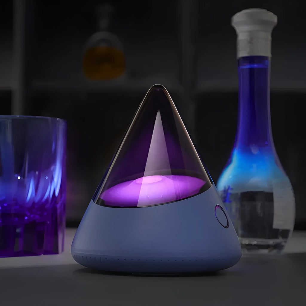 M3 small night lamp in colourful blue with geometric stereo design on a table