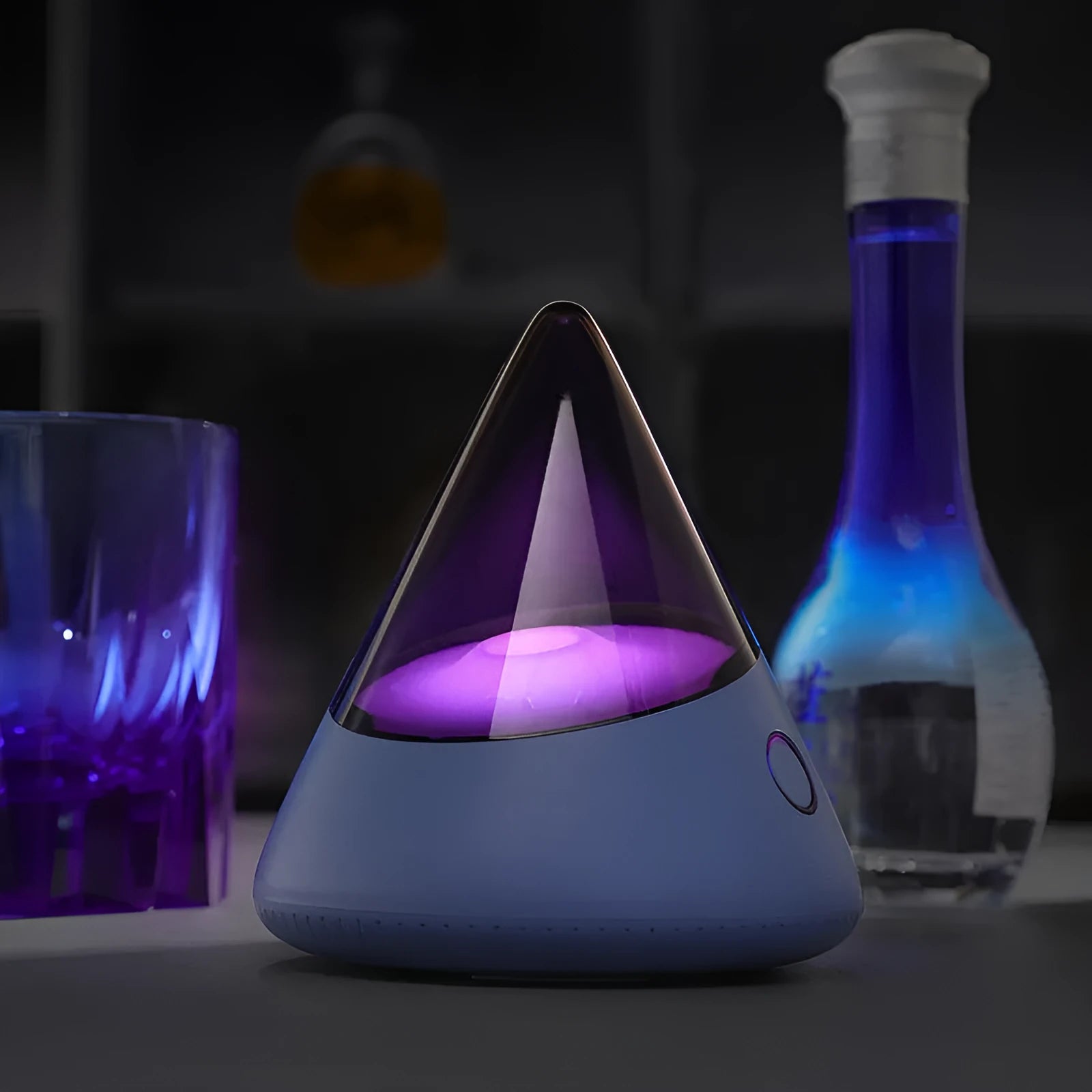M3 small night lamp in colourful blue with geometric stereo design on a table