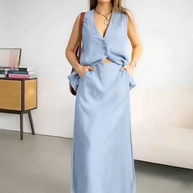 Women's polyester two-piece set with sleeveless vest top and long skirt in blue colour