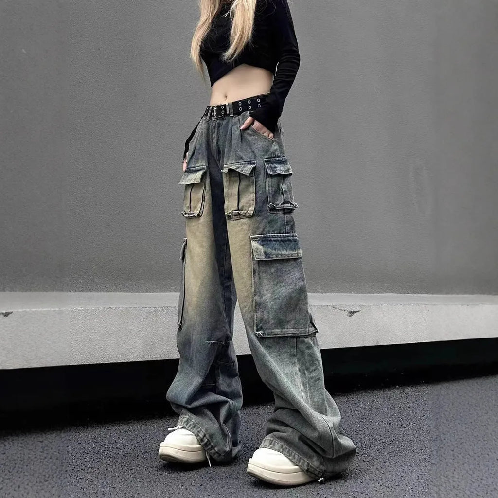 Loose fit denim pants with multiple pockets in washed distressed light blue finish