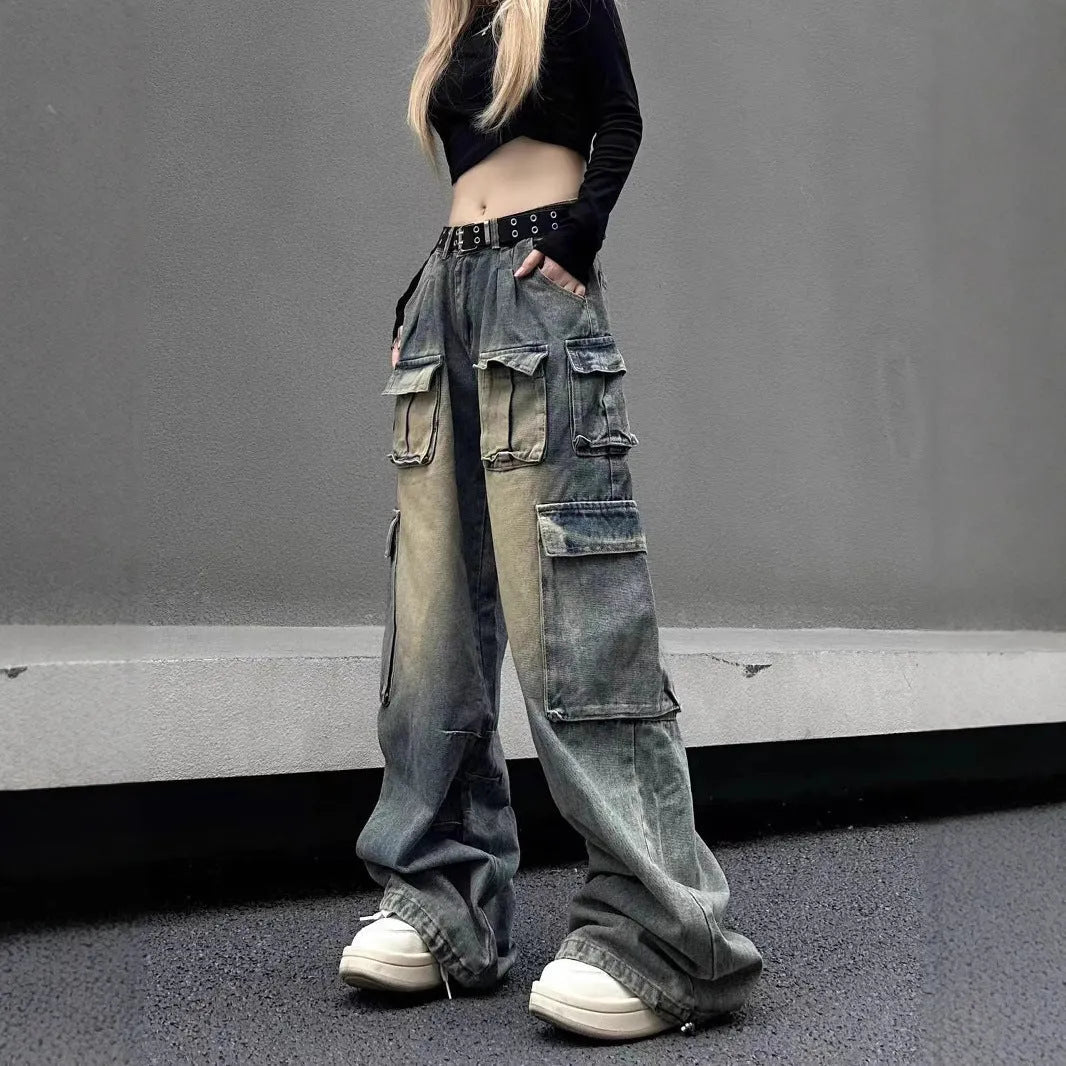 Loose fit denim pants with multiple pockets in washed distressed light blue finish