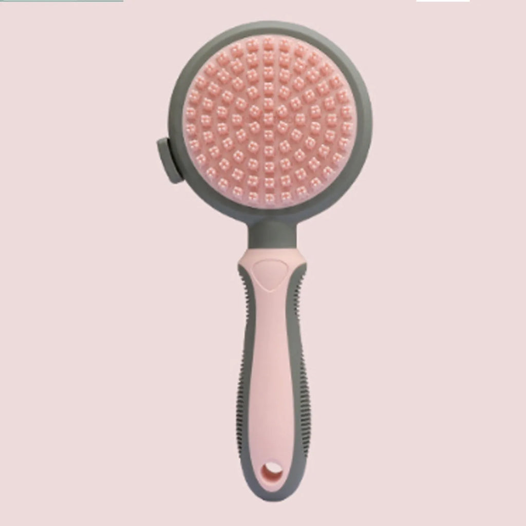 Double sided pink cat brush with release button and separate flea comb for grooming