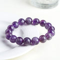 Natural feather amethyst Snow Mountain purple scattered bead crystal bracelet with ruyi charm.