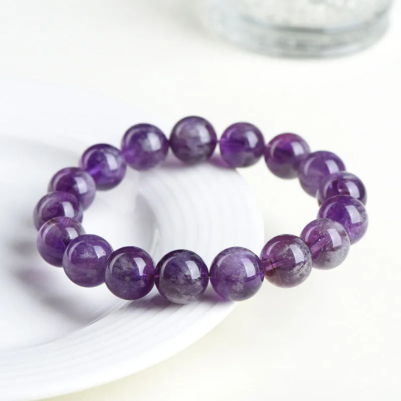 Natural feather amethyst Snow Mountain purple scattered bead crystal bracelet with ruyi charm.