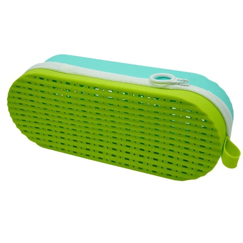 Silicone glasses case in multiple colours, showing long hand shape and scale next to a pair of spectacles.