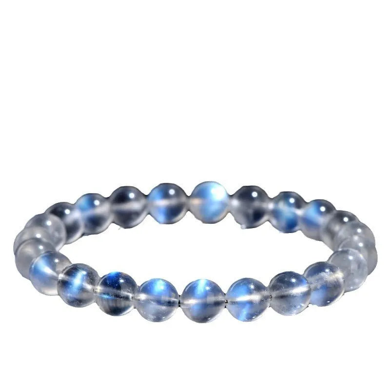 Natural cream blue moonlight crystal bracelet with polished surfaces and simple unisex design