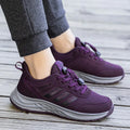 Breathable mesh loafers with elastic band closure in black, dark grey, purple, and purplish red.