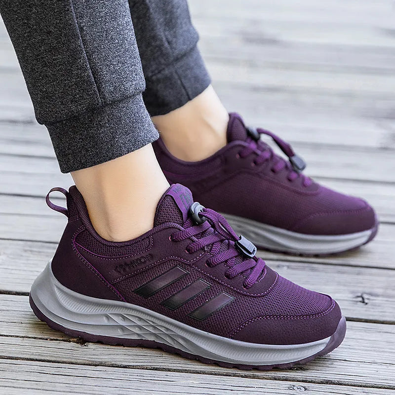 Breathable mesh loafers with elastic band closure in black, dark grey, purple, and purplish red.