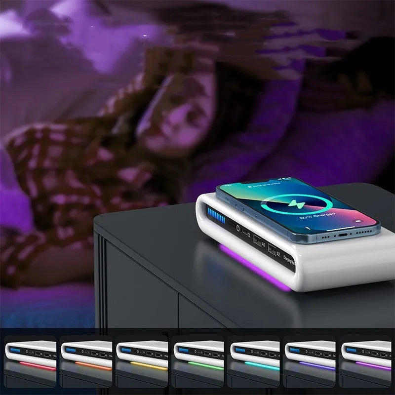 White rectangular desktop wireless charging pad with integrated multi-colour atmosphere lamp.