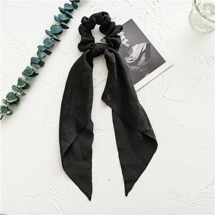 Spring dark green cloth hair tie with large intestine ring design and floral bandeau decoration