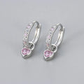 Women's heart-shaped ear clips with a coloured stone, available in gold or white gold colour.