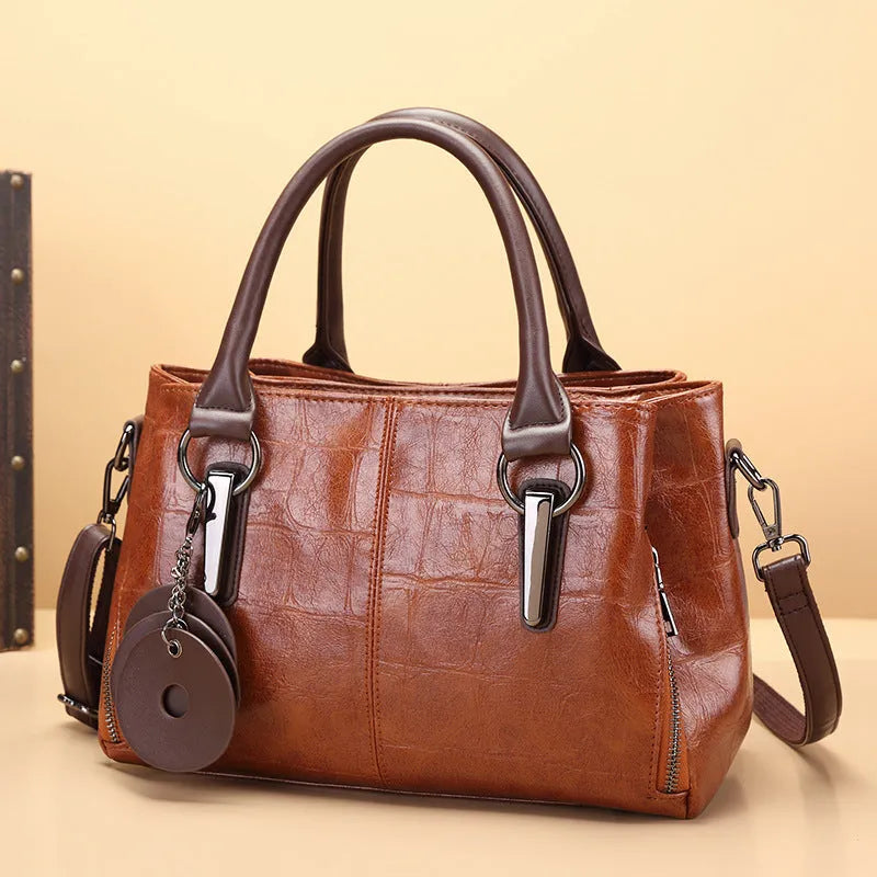 Large capacity shoulder bag in vintage brown with horizontal square design and multiple internal compartments
