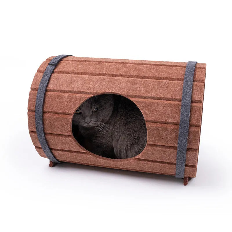 Assembled wine barrel shaped cat bed made from brown polyester fibre felt.