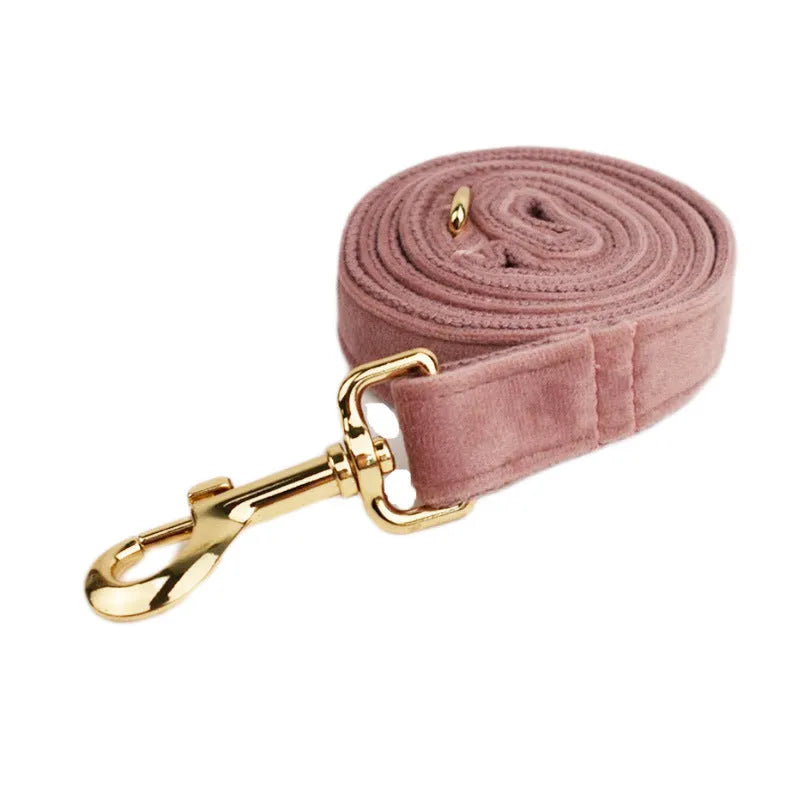 Light purple pink velvet dog collar set with leash, vest, bow, and poop bag accessories