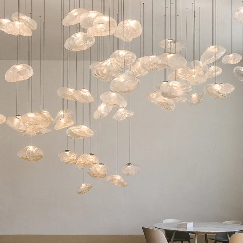 Modern glass and fabric chandelier light fixture in amber, clear or smoke grey.