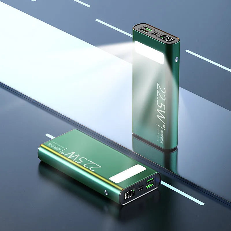 Black alloy power bank showing LCD display and USB ports, dimensions 140x66.5x27.5mm
