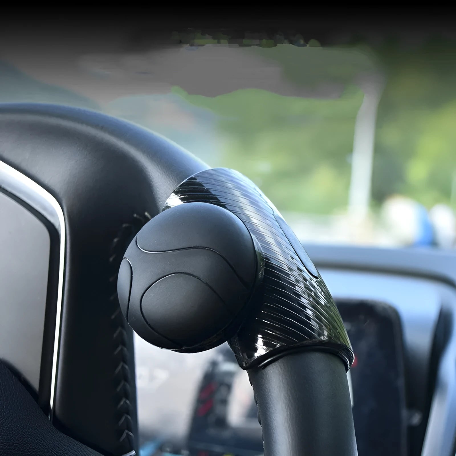 Silicone steering wheel assist ball with metal bearing in black or blue colour