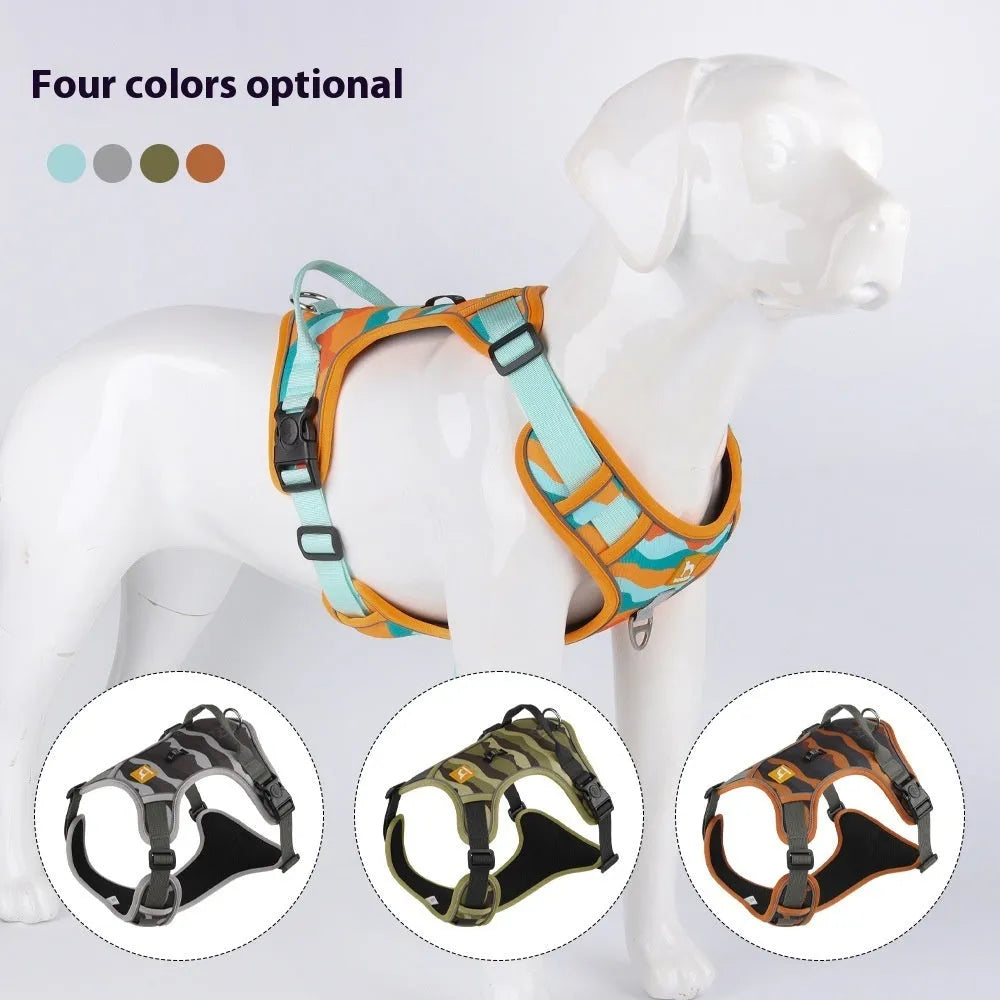 Orange reflective dog chest and back harness with an attached hand-holding rope on a grey background.