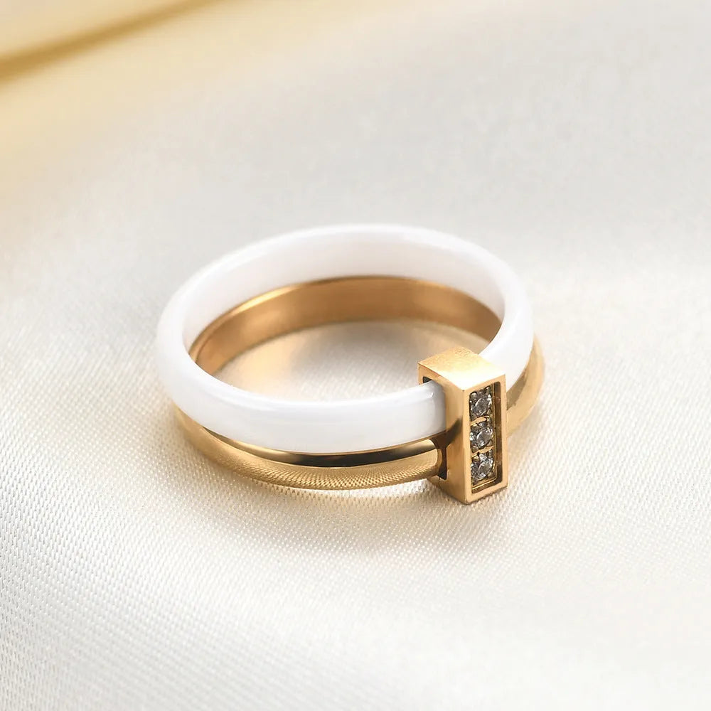 Ceramic geometric ring with glossy stitching inlaid zirconium in steel black colour