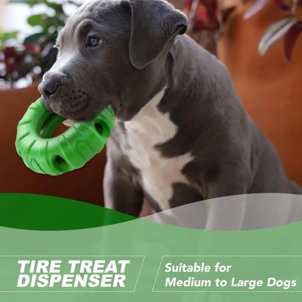 Blue natural rubber tyre-shaped dog chew toy and slow feeder on a wooden floor