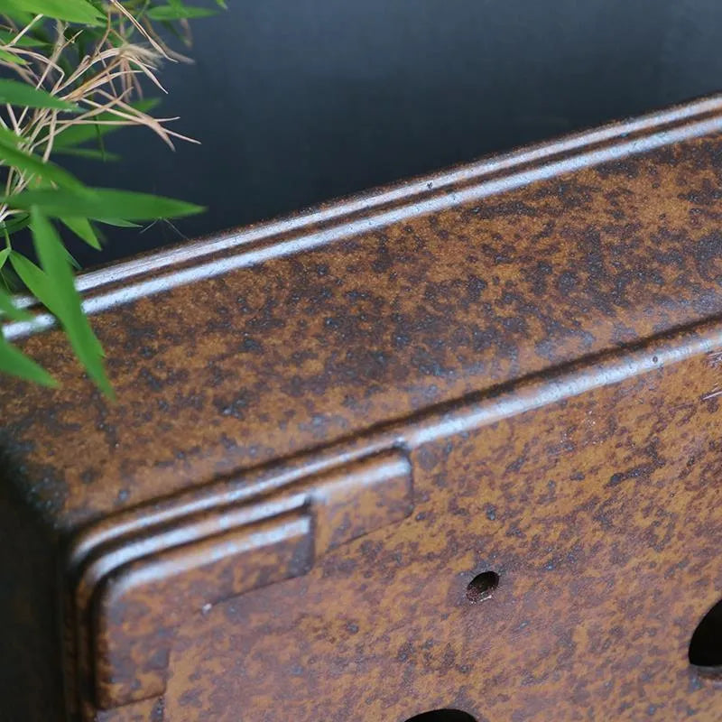 Purple sand rectangular bonsai planter with five-line basin design on wooden surface