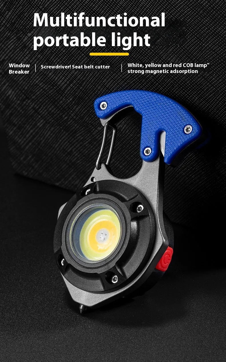 Compact silver and black multifunctional keychain flashlight with keyring, display screen, and integrated window breaker tool.