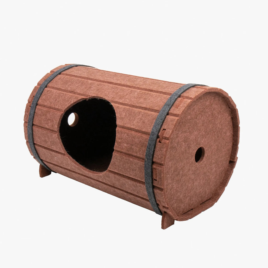 Assembled wine barrel shaped cat bed made from brown polyester fibre felt.