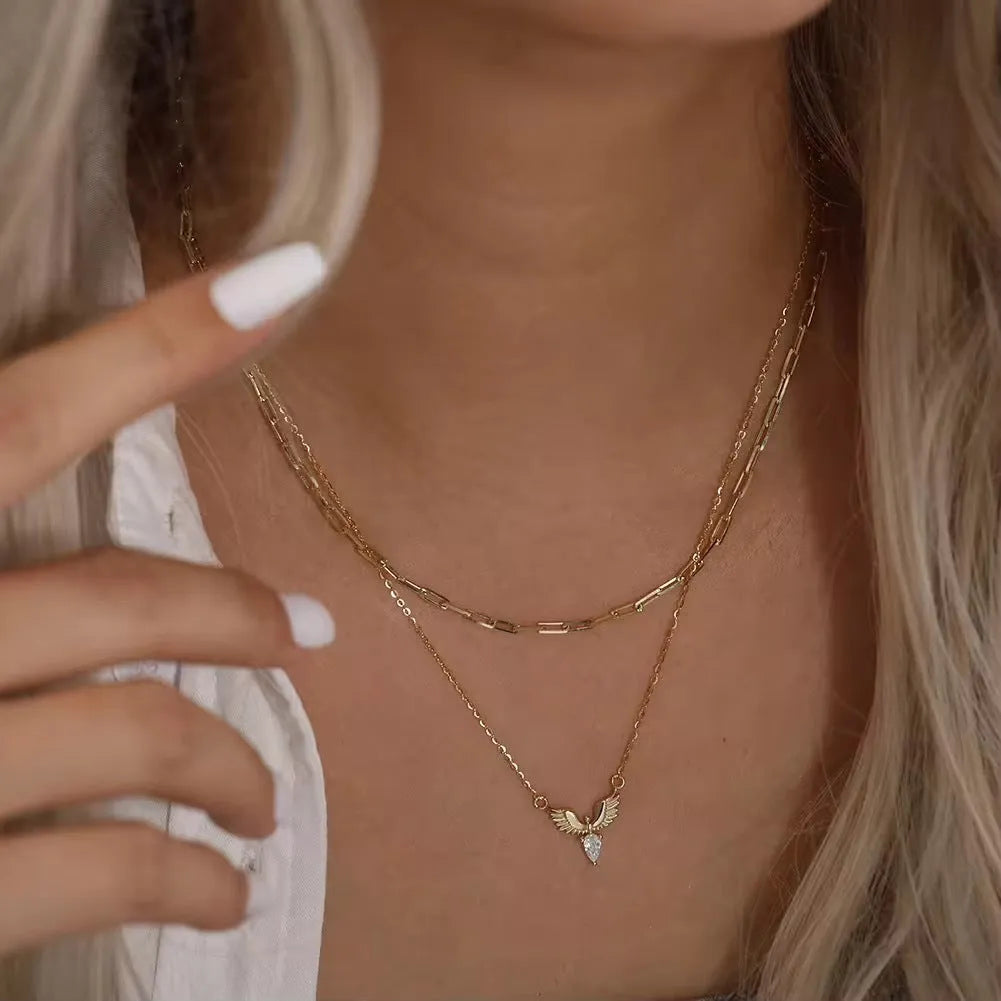 925 silver adjustable necklace with eagle pendant on O-ring chain in white gold or yellow gold colour.