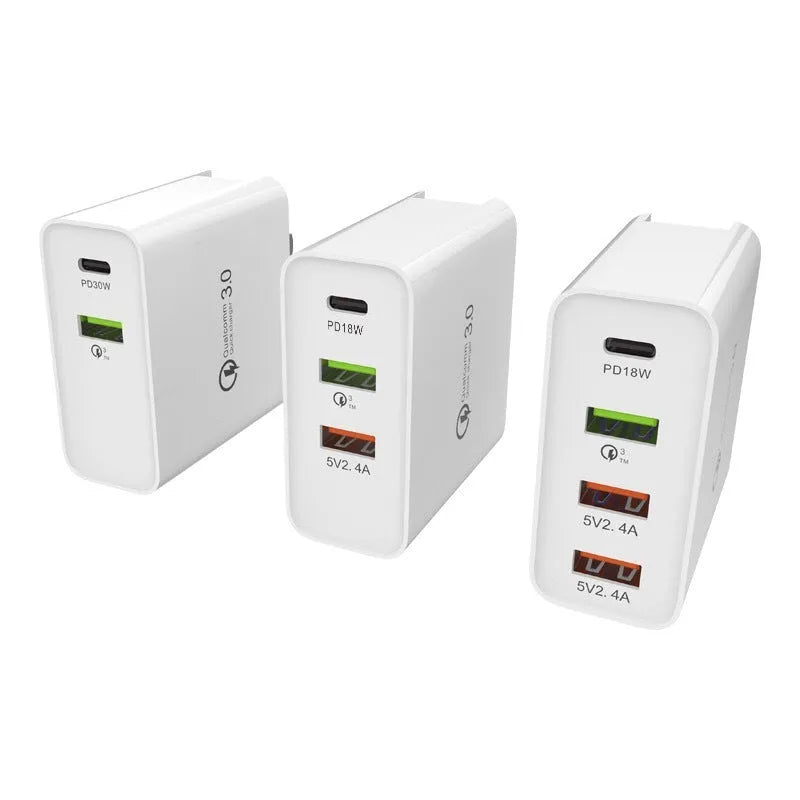 White multi-port fast charger with PD and QC support showing multiple USB ports.